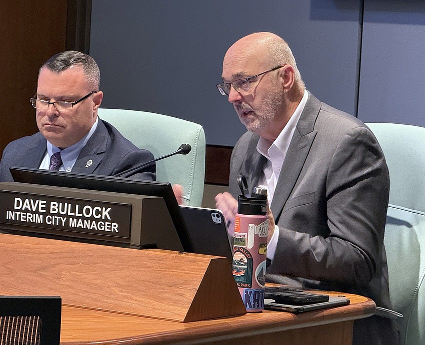 Interim City Manager Dave Bullock and Deputy City Manager Patrick Robinson at the dais.