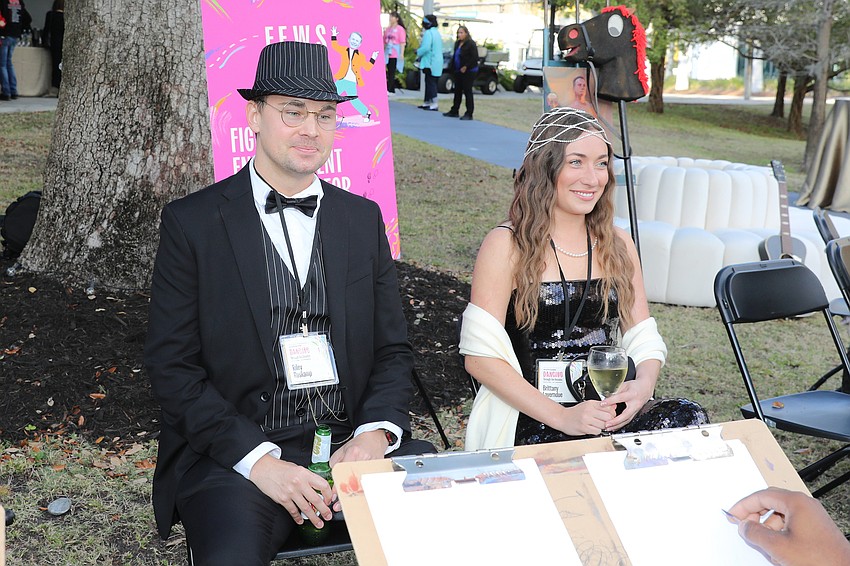 Riley Roskamp and Brittany Laverndue sit for portraits.