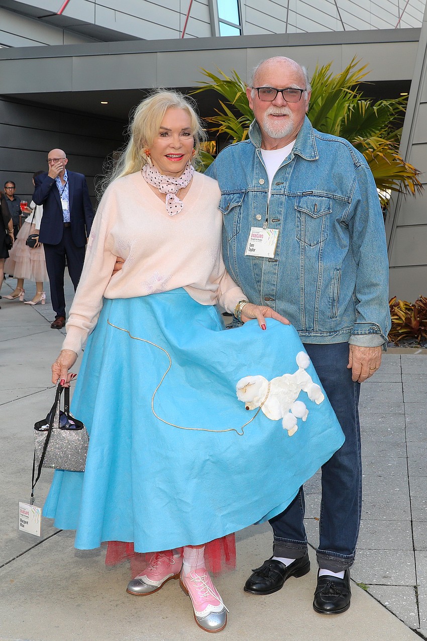 It's fashion unleashed for Margaret Wise and her dashing Fonzie-styled date, husband Thomas Taylor.