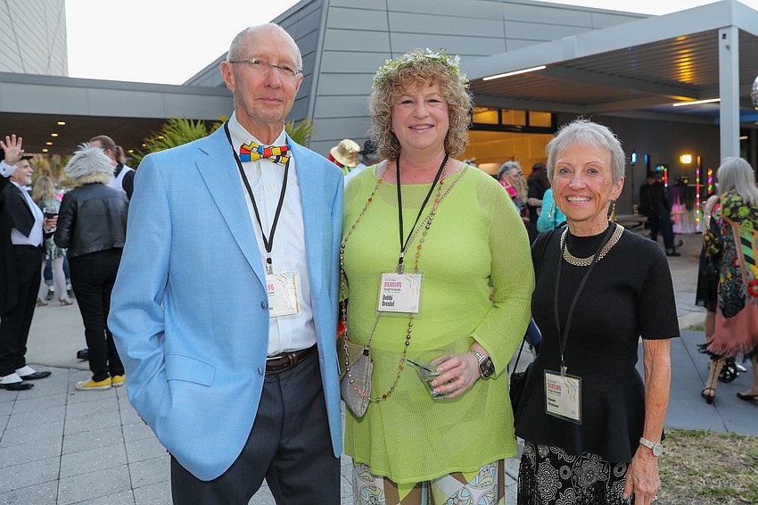 Tom Watson, Debbi Breslof and Gewn Watson in their art deco-themed garb.