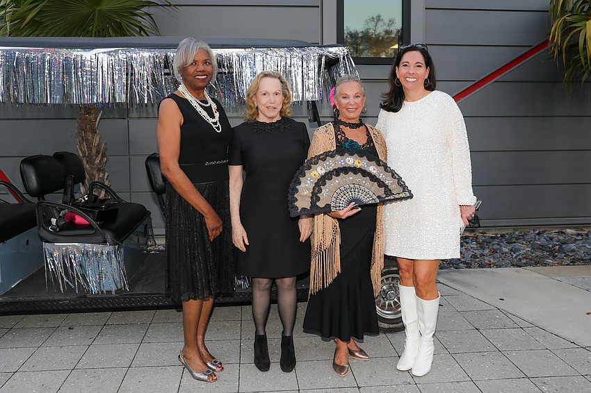 Event co-chairs are Michele Hooper, Jenne Britell and Julie Harris who are photographed with Sara Robinson, vice president of advancement.