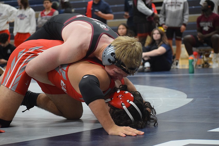 At 165 pounds, senior Evan Rowe (top) represents Braden River's highest-ranked wrestler. He's lost only three times in 61 matches this season. At 165 pounds, senior Evan Rowe (top) represents Braden River's highest-ranked wrestler. He's lost only three times in 61 matches this season.