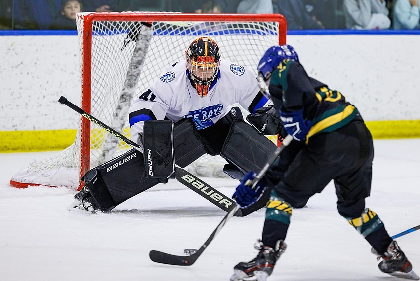 Now-junior goaltender Kevin Moore of the Sarasota Ice Rays prepares to stop a shot in the 2024 junior varsity championship of the Lightning High School Hockey League. His mother, Laurie Moore, founded the program ahead of the 2023-24 LHSHL season.