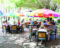 Diners sit outside at Lazy Lobster. Owner Michael Garey said business really starts to ramp up in February before March, April and May, the busiest months of the year for the restaurant.