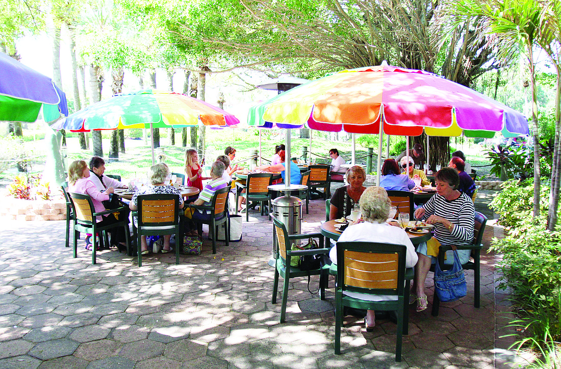 Diners sit outside at Lazy Lobster. Owner Michael Garey said business really starts to ramp up in February before March, April and May, the busiest months of the year for the restaurant.