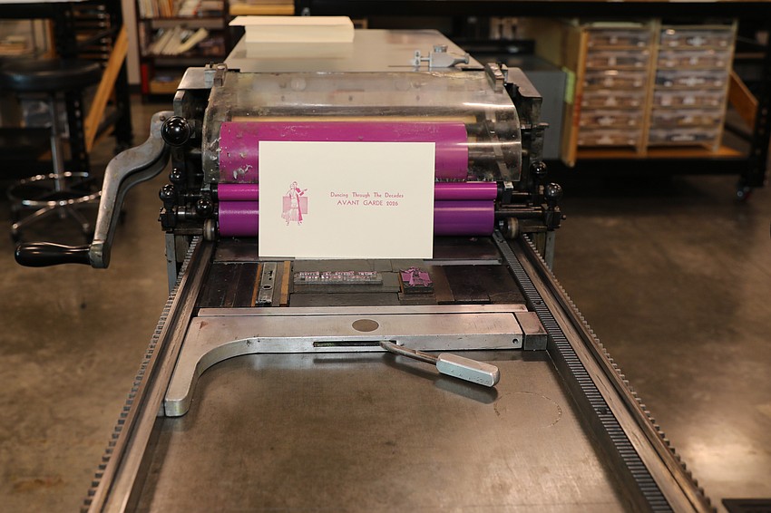 The printmaking studio at RCAD was busy as guests enjoyed a chance to use the mechanical printing press.
