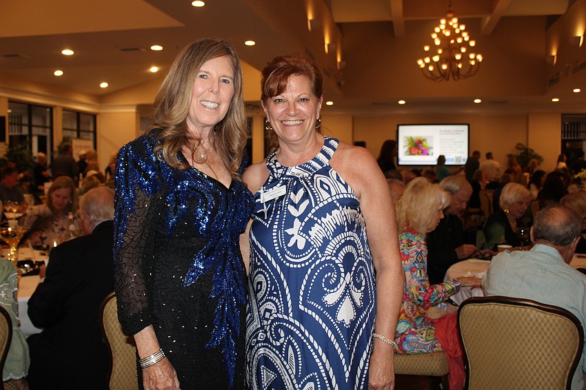 Lyn Haycock, one of the main coordinators of Taste of the Keys, and Melanie Dale, president of the Longboat Key Garden Club, greet guests at the fundraiser on Feb. 26 at the Longboat Key Club Harbourside Ballroom.