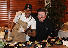 Javaughn Wallace and executive chef Michael from Drift at Lido Beach Resort dish up a poached pear and prosciutto bite at the 15th annual Taste of the Keys on Feb. 26 at the Longboat Key Club Harbourside Ballroom.