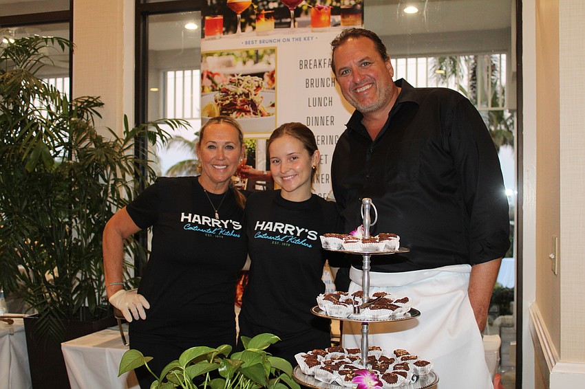From Harry's Continental Kitchens, a longtime supporter of the Longboat Key Garden Club's Taste of the Keys, Lana Murphy, Maja Zoller and Hal Christensen keep their booth stocked with one of the night's popular bites, their braised beef rib with polenta.