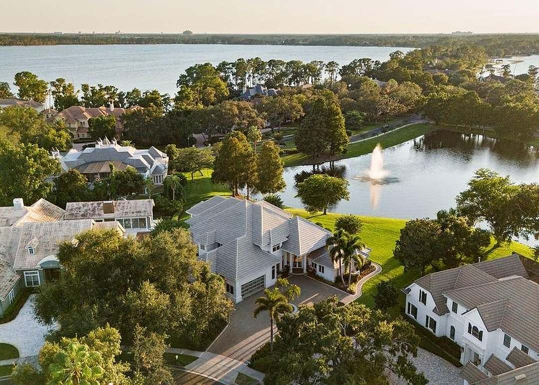 The home at 9138 Great Heron Circle, Orlando, sold Feb. 26, for $2,800,000. Built by Ray Coudriet and designed by architect Tom Price, this custom estate was crafted to withstand winds up to 145 mph. The sellers were represented by Benjamin Hillman, LPT Realty LLC.