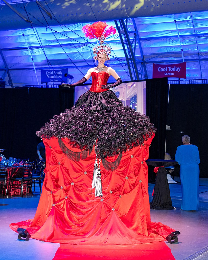 Kathryn Susak offers a photo op to the guests.