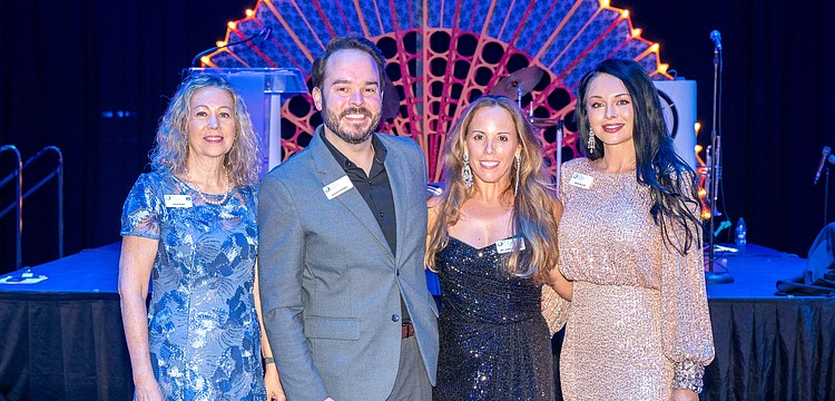 Lynne Anast, Joshua Perez, event co-Chairs Dr. Gaby Lodeiro and Missi Miller