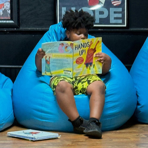 A Volusia County child explores a book in one of the new reading corners at the Boys & Girls Clubs of Volusia/Flagler Counties. Courtesy photo