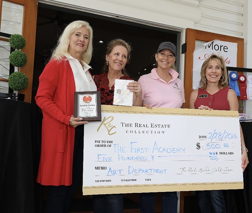 The First Academy received the Community Service Award, which included a $500 check.