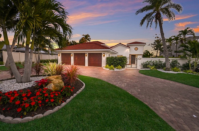 The home at 4833 Featherbed Lane was built in 1956 and has four bedrooms, three-and-a-half baths, a pool and 2,978 square feet of living area.