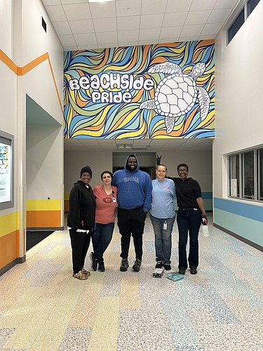 The Seabreeze custodian team: Sierra Reeves, Salek Faranz, Head Custodian Adrian Henderson, Sherry Inman and Monique Riddick. Courtesy photo