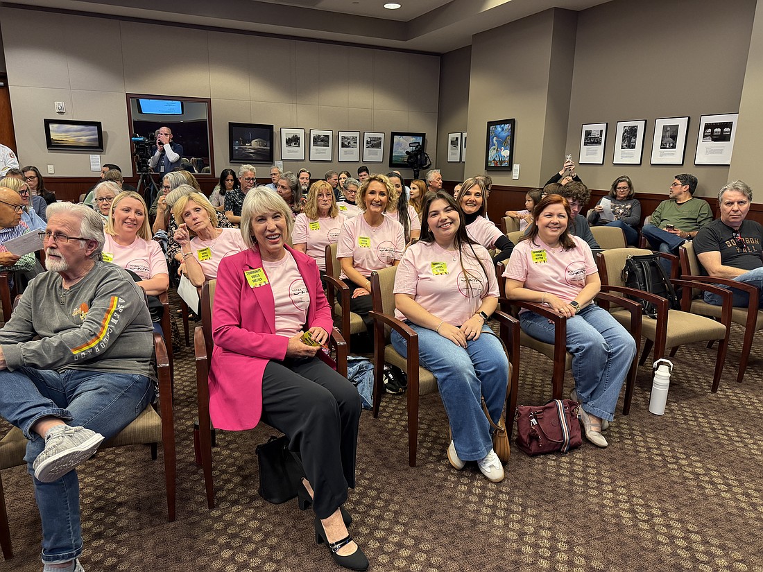 Heidi Hardman, the owner of Polka Dotz, and other residents and supporters of the local business wore matching shirts to advocate for community voices at the Winter Garden City Commission meeting Thursday, Feb. 26.