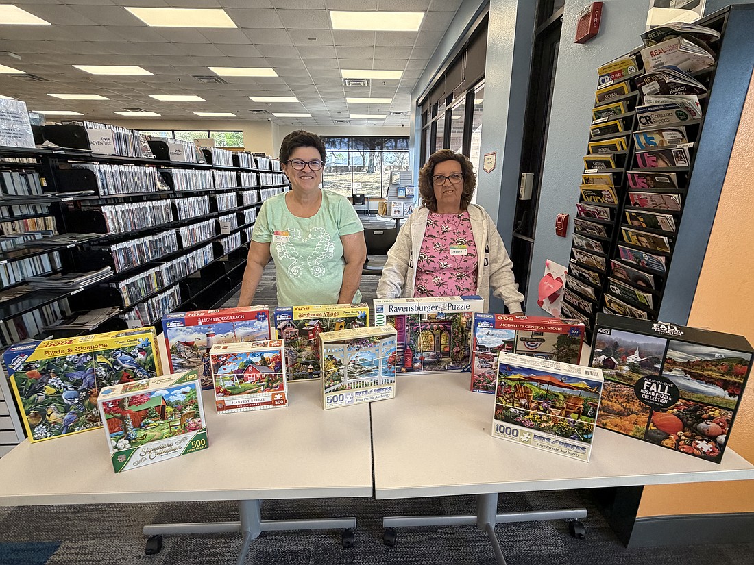 Ocoee residents and sisters Lucie McHan and Maria Santos were pleased with their first Central Florida Puzzles exchange. They love finding new puzzles to add to their collection.
