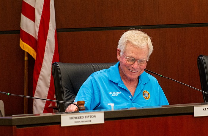 Longboat Key Mayor Ken Schneier struck the gavel for the last time Monday after 14 years of volunteer service on town boards and the commission.