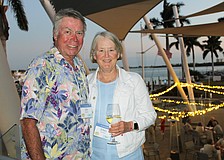 Jim and Ellen Kelleher take in the breeze from Sarasota Bay while socializing at the March 3 St. Armands Key Residents Association dinner at the Sarasota Yacht Club.