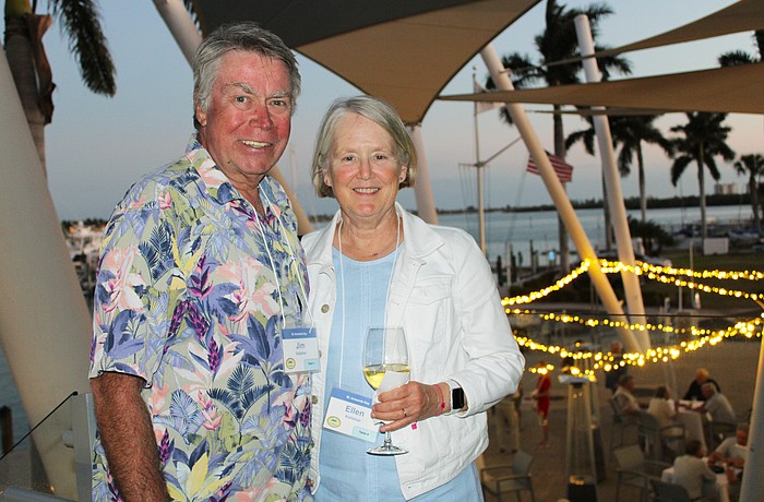 Jim and Ellen Kelleher take in the breeze from Sarasota Bay while socializing at the March 3 St. Armands Key Residents Association dinner at the Sarasota Yacht Club.