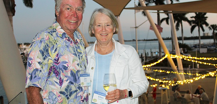 Jim and Ellen Kelleher take in the breeze from Sarasota Bay while socializing at the March 3 St. Armands Key Residents Association dinner at the Sarasota Yacht Club.