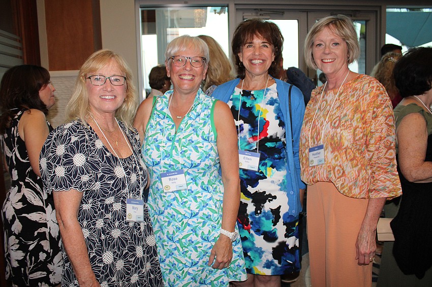 Mary Finnn, Rose Kelly, Ellen DeZio and Heather Fitzpatrick attend the St. Armands Key Residents Association annual dinner on March 3 at the Sarasota Yacht Club.