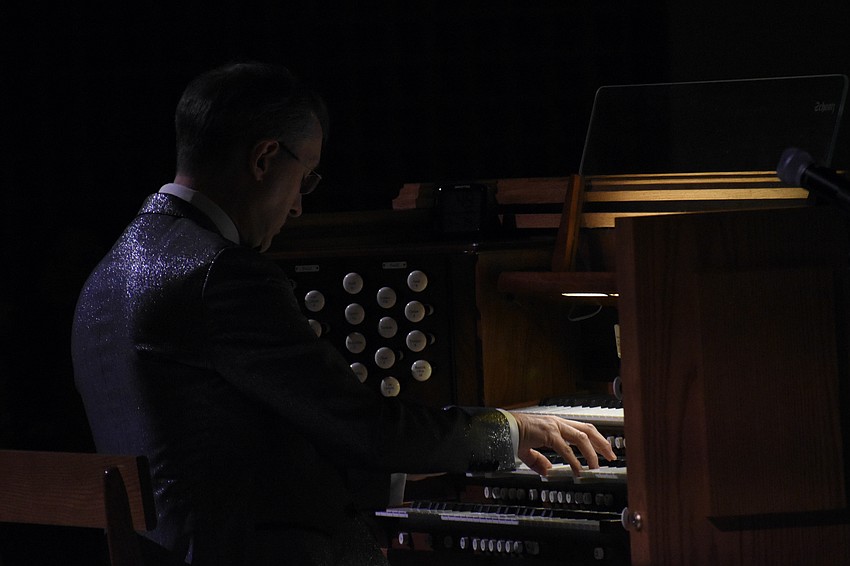 Olivier Latry performs on the organ.