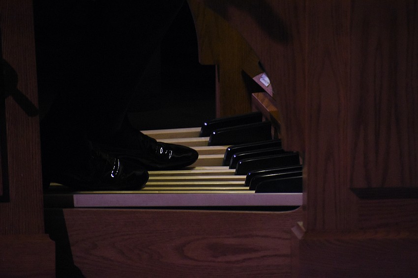 Olivier Latry uses his feet during the performance.