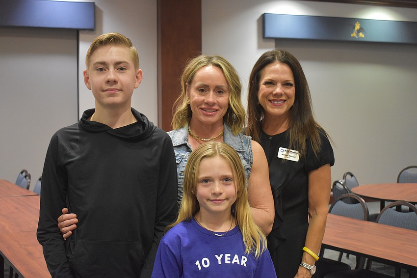 Parrish's Jaxson Wirth and Addison Wirth (front) joined their mom, Jennifer Wirth, to attend the event with Melissa Wandall, president of the Mark Wandall Foundation.