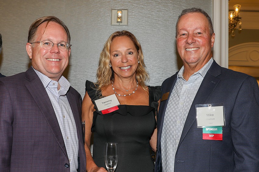 David Luginbuel with Tammy and Mike Uselton