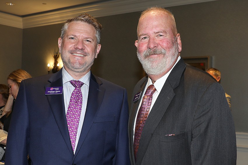 President and CEO of Empath Health is Jonathan Fleece with Brad Perkins, president of Tidewell Hospice.