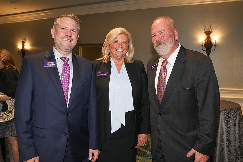 Tidewell Foundation President Delesa Morris with Jonathan Fleece and Brad Perkins
