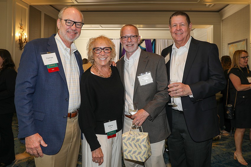 Tom and Sherry Koski with Gordon Clay and Ken Esthus