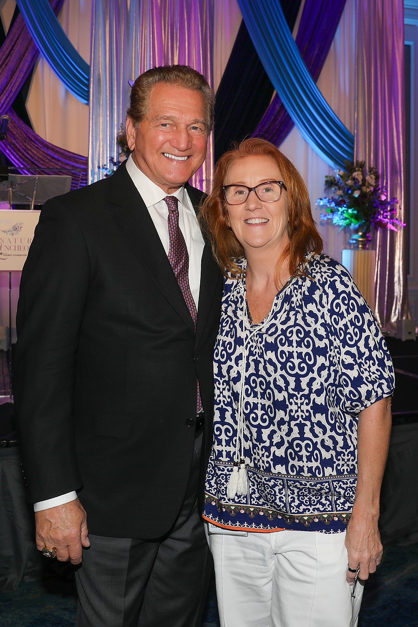 Joe Theismann with longtime fan Carolyn Braun.