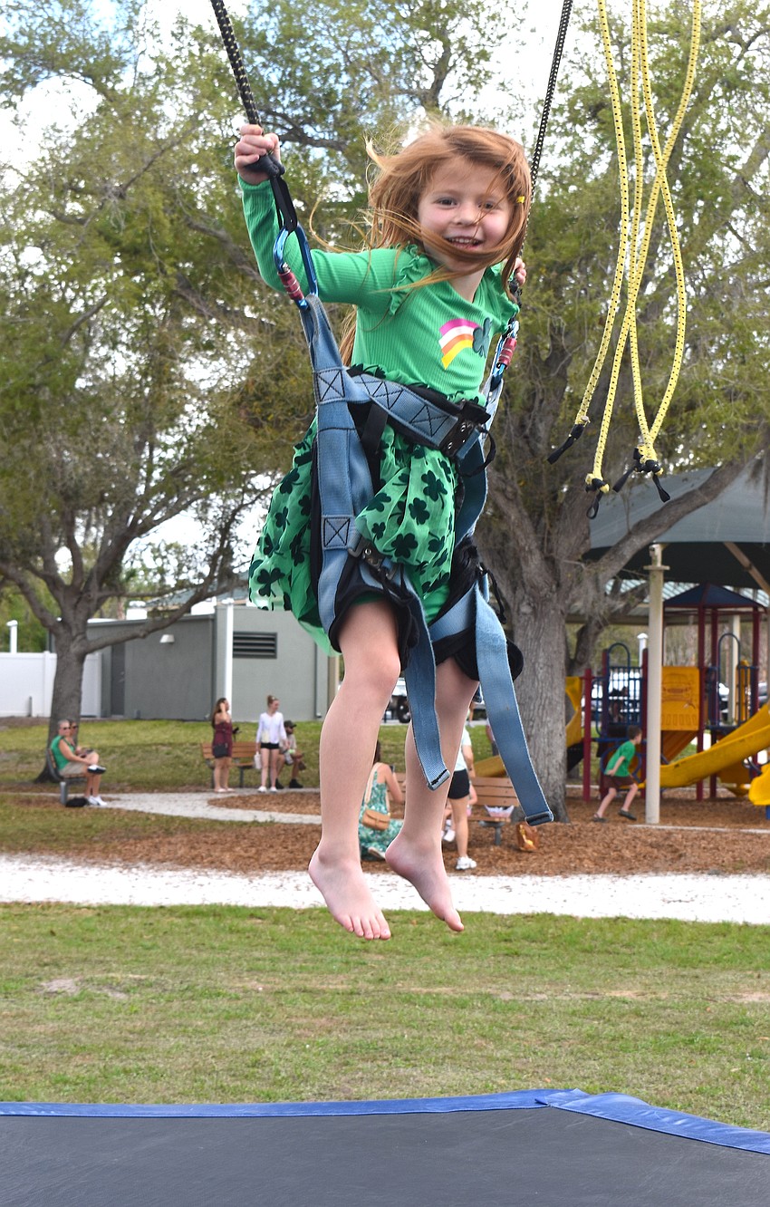 Bradenton's Madison Hokanson, 5, jumps for joy at the Irish Celtic Festival.