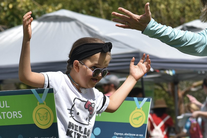 Mina Giorgia does poses with Frances Bermudez, activation and programming manager at The Bay.