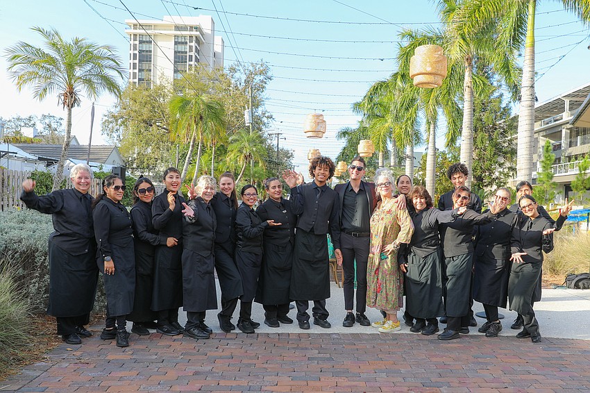 35 Michael's on East employees serve 220 guests at Selby Gardens during the annual Garden to Plate Wine Dinner.