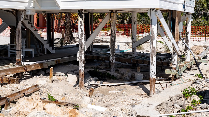 The support beams, or pilings, the Half Moon House sit on have visible wear, and a pile assessment by a marine structural engineering firm notes that 80% of the house’s pilings have rot or splits between the sand line and girder.