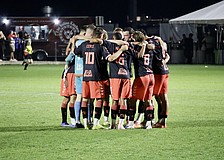 The Sarasota Paradise huddle before the second half against AC Boise. The team previously played in USL League Two for the past three seasons and finished first in the South Florida division for 2024 and 2025.
