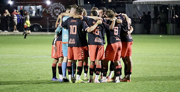 The Sarasota Paradise huddle before the second half against AC Boise. The team previously played in USL League Two for the past three seasons and finished first in the South Florida division for 2024 and 2025.