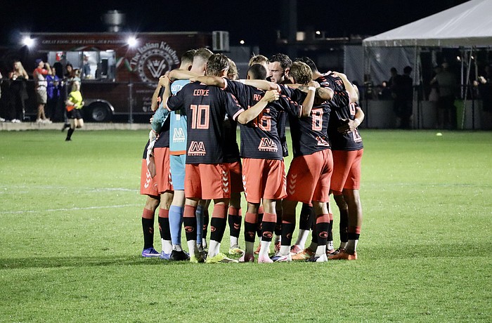 The Sarasota Paradise huddle before the second half against AC Boise. The team previously played in USL League Two for the past three seasons and finished first in the South Florida division for 2024 and 2025.