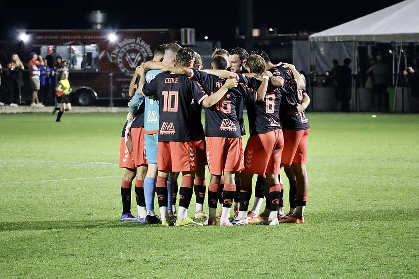 The Sarasota Paradise huddle before the second half against AC Boise. The team previously played in USL League Two for the past three seasons and finished first in the South Florida division for 2024 and 2025.