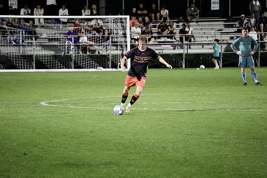 Ethan Bryant prepares to boot the ball toward the opposing box. The 5-foot-11 midfielder registered one of the Paradise's 13 shots in their professional debut.