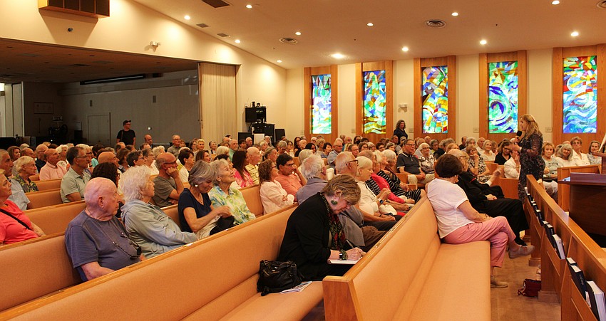 Temple Beth Israel Rabbi Jessica Spitalnic Mates speaks to a packed house at the screening of 