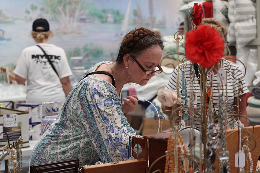 Shopper Stephanie Claussen said she wanted to get to the Royal Rummage Sale early to check out the jewelry selection.