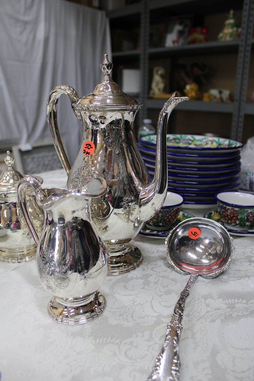 The art and fine wares section of the Royal Rummage Sale was abuzz with shoppers at the early-bird sale.