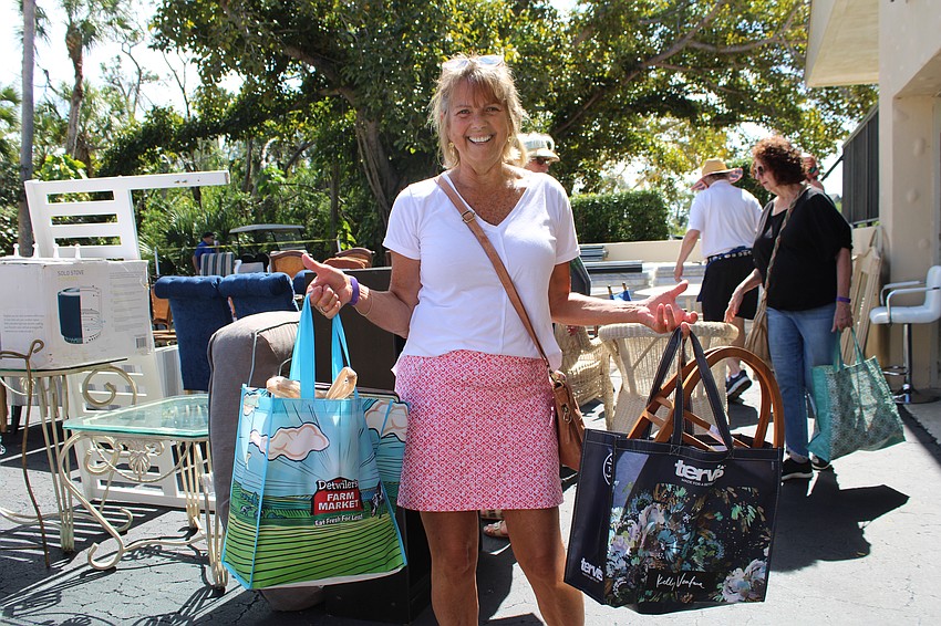 Jenny Phillips, who recently moved to Longboat Key from Minnesota, was thrilled with her finds at the Royal Rummage Sale.