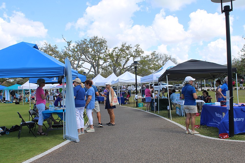 Tents dotted the walkways around the Town Center Green, where Longboaters visited with representatives from local businesses, nonprofits, religious groups and more about upcoming events.