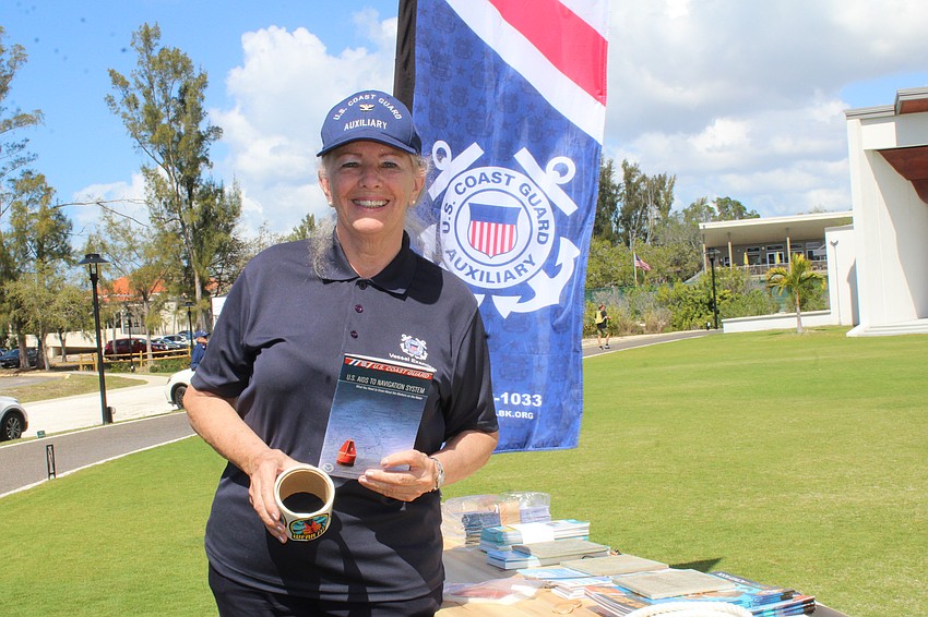 Marsha Grogan from the U.S. Coast Guard Station in Cortez highlights boater safety tips at the Longboat Key open house.